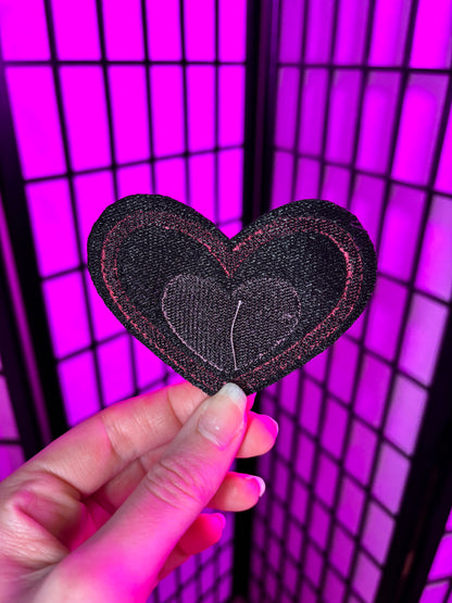 Back of the Valentine's Day Fizzarolli patch showing thread, not adheseive. This patch is sew on only. Inspired by Helluva Boss
