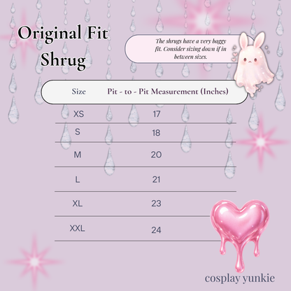 Size chart for a shrug with a pink background and decorative elements.